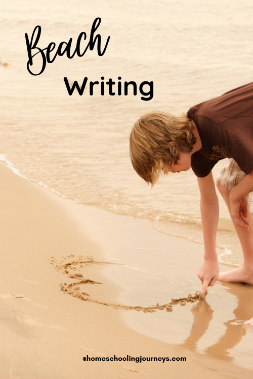 An image that shows a child writing in the sand at the beach. 