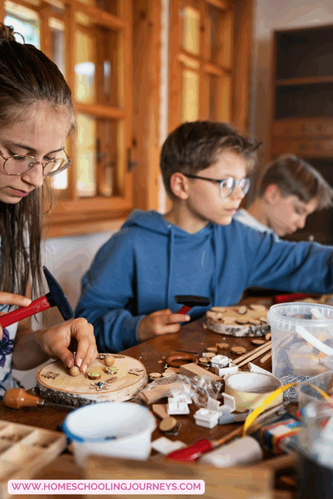 An image of children doing wood and items found outside,, like seeds, wood chips to decorate a wooden round.