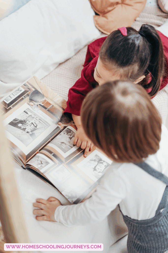 An image of kids on the bed reading a book.